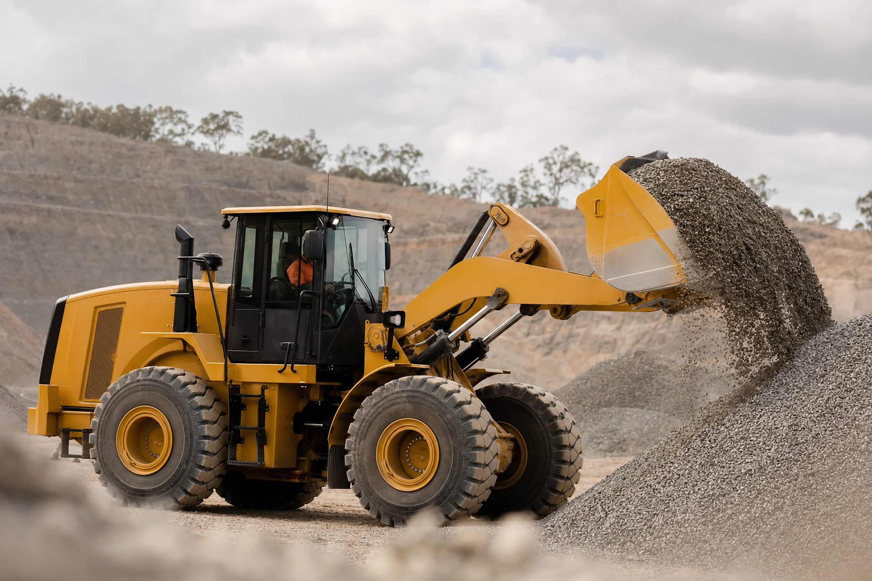 Wheel loader scooping gravel at an Australian quarry