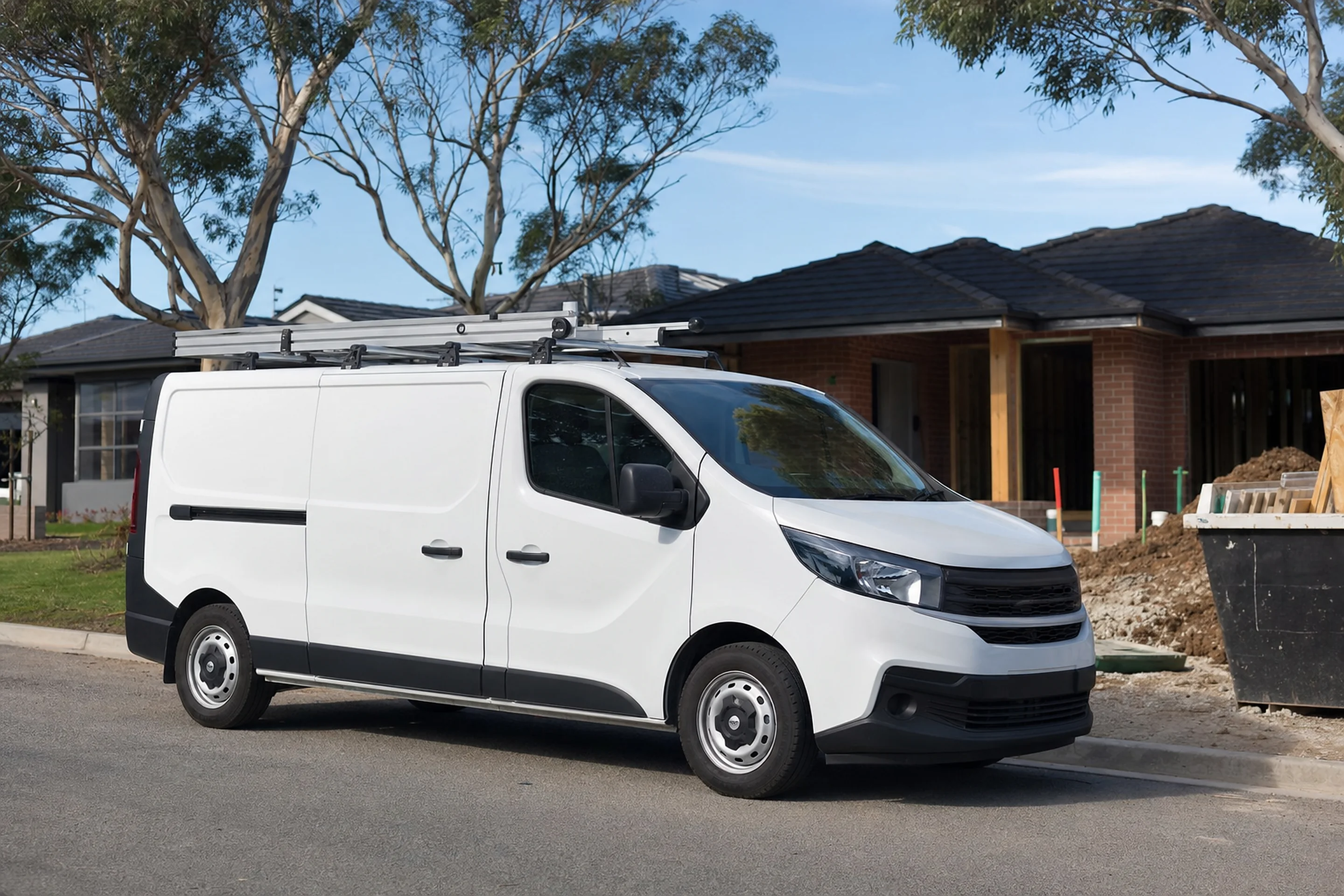 White commercial work van parked on an Australian suburban street